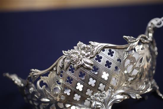An antique Dutch? pierced silver two handled dish, 15 oz.